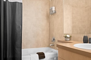 Combined shower/tub, hair dryer, towels, soap