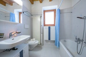 Family Townhome, Multiple Bedrooms, Mountainside (Ca' Pinina) | Bathroom | Combined shower/tub, hair dryer, towels, soap