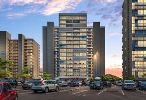 English Towers offers stunning city views from its modern high-rise building with a prominent entrance.