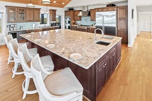 Fridge, microwave, oven, stovetop - Luxury Semi-Oceanfront Home w/ Pool, Elevator, Theater Room, and Game Room (Hatteras)