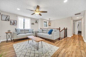 Smart TV, fireplace, table football, books