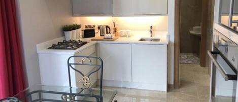 Apartment | Private kitchen | Fridge, microwave, oven, stovetop