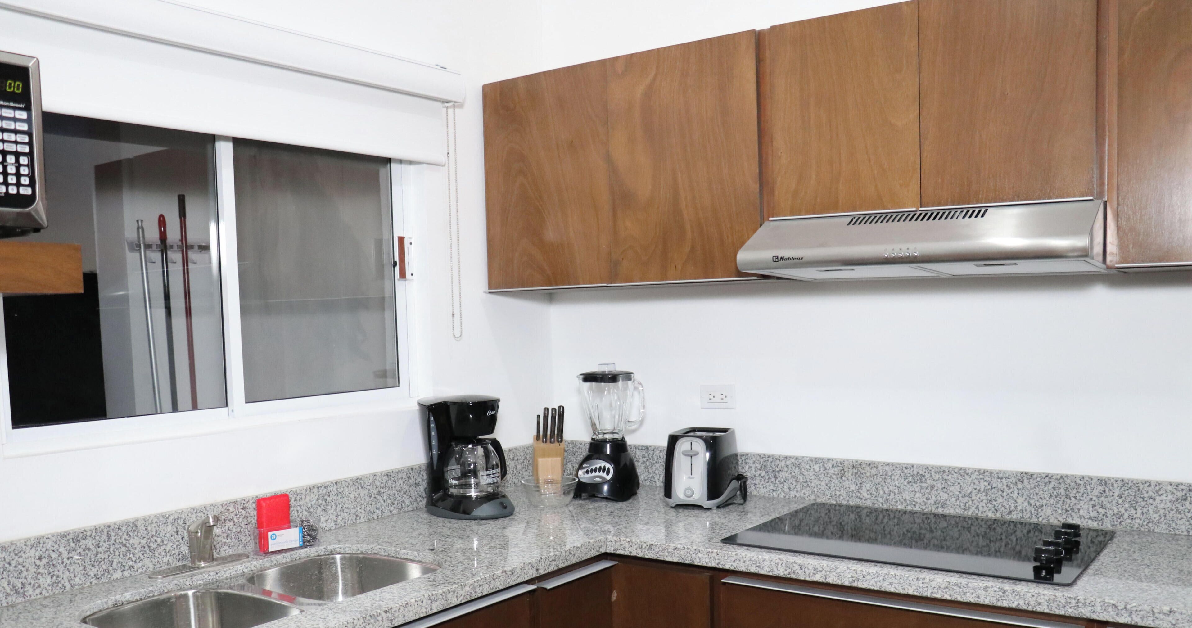 Fridge, microwave, coffee/tea maker, toaster
