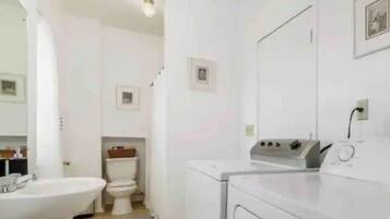 Shower, towels, toilet paper