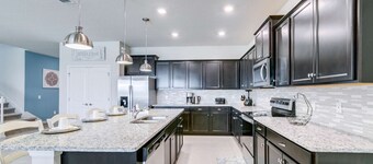 Beautiful Pool Villa, near Disney, gated resort, sleeps 22, games room.