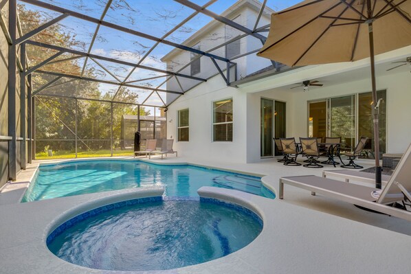 A heated pool, sun loungers