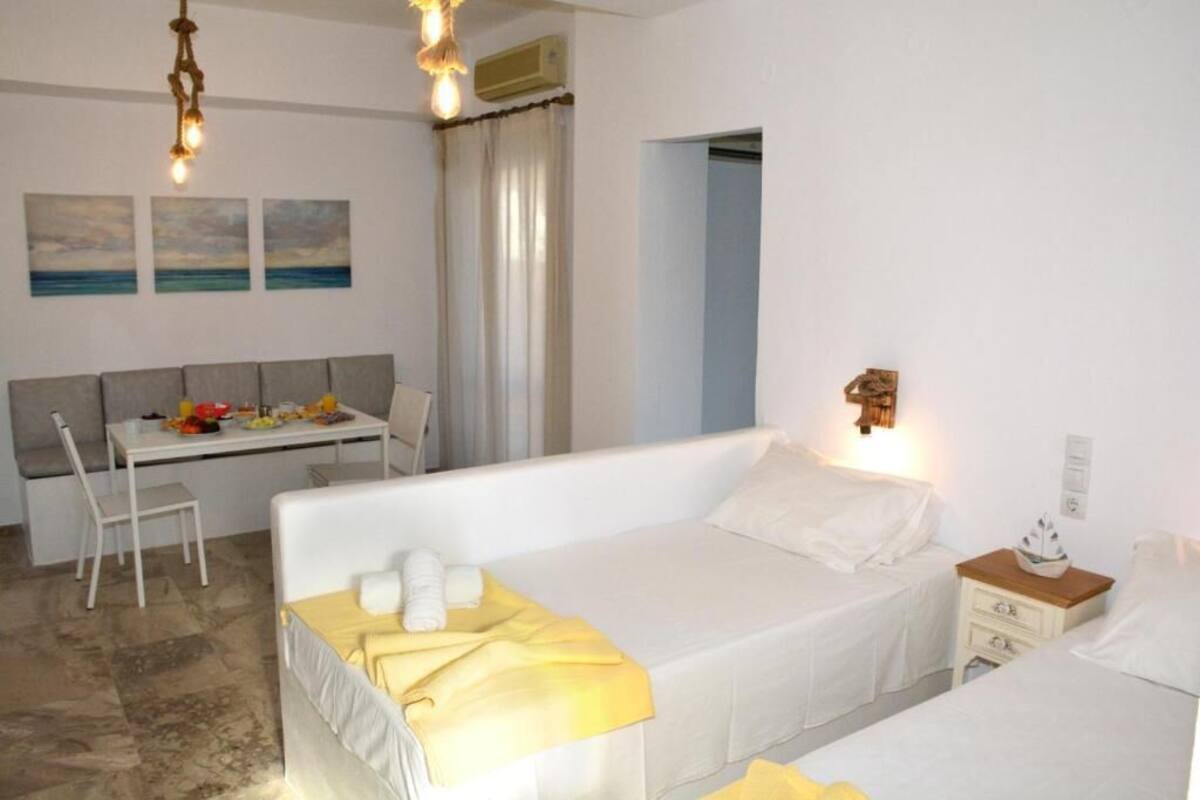 Familierom | Sengetøy av topp kvalitet, minibar (inkludert) og strykejern/-brett