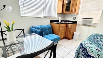 1 bedroom, desk, iron/ironing board, travel cot