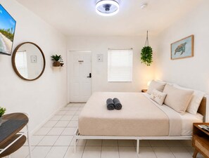 1 bedroom, desk, iron/ironing board, travel crib