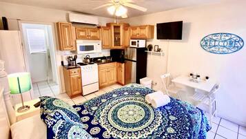 1 bedroom, desk, iron/ironing board, travel crib