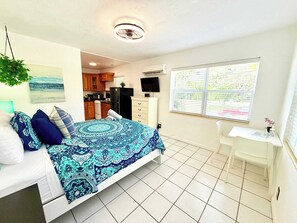 1 bedroom, desk, iron/ironing board, travel cot