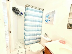 Shower, hair dryer, towels
