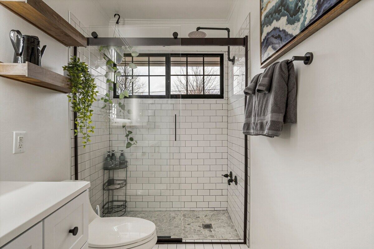 Shower, hair dryer, towels, toilet paper