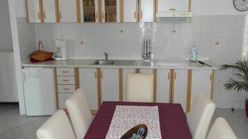 Apartment (Two-bedroom Apartment with Balcony an) | Private kitchen | Fridge