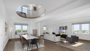 Premium Penthouse | Living area | 55-inch Smart TV with digital channels, TV - The Grand Castle Apartments (Grandville)