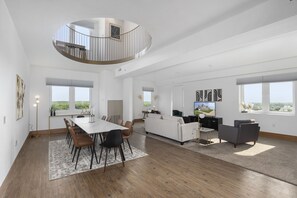 Premium Penthouse | Living area | 55-inch Smart TV with digital channels, TV - The Grand Castle Apartments (Grandville)