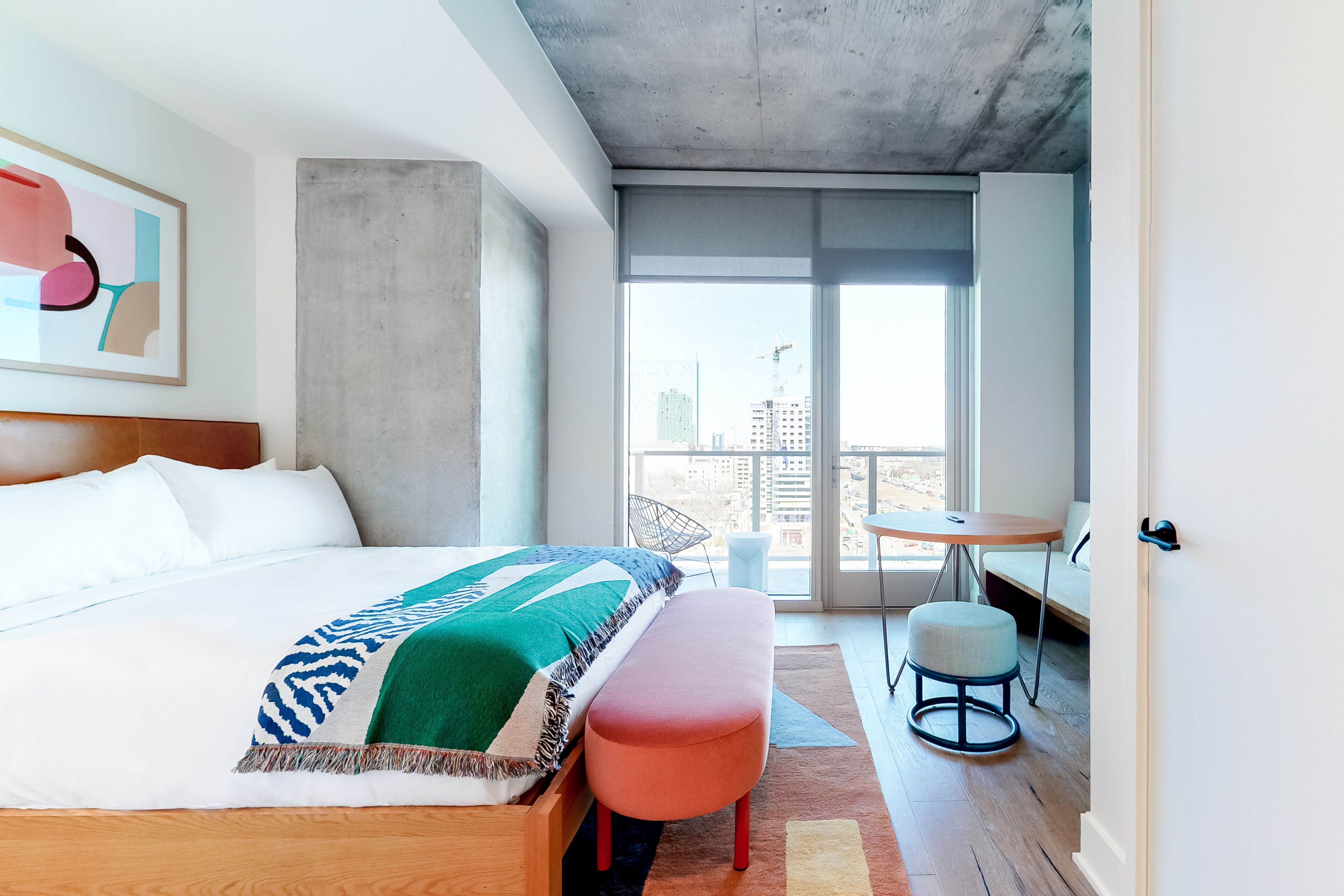 Brand new Rainey Street condo with city views, balcony, WiFi, and rooftop pool