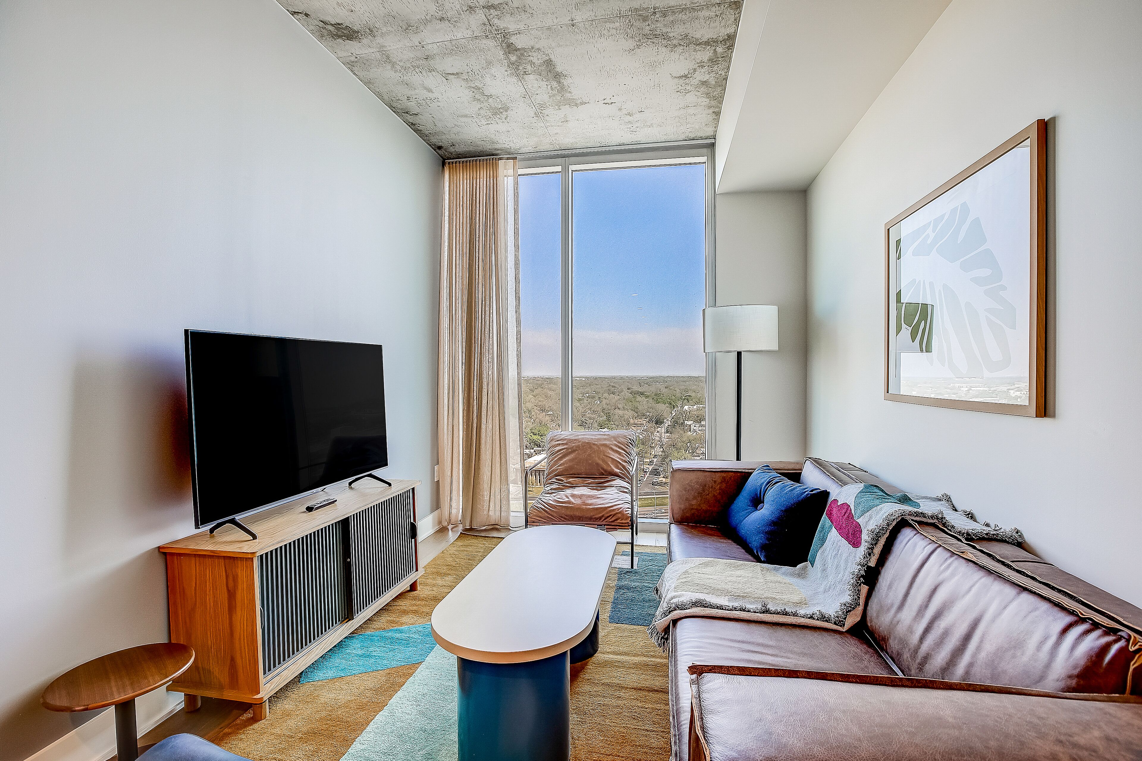 Brand new hideaway in the heart of the city with rooftop pool, terrace, and gym