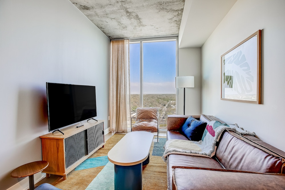 Brand new hideaway in the heart of the city with rooftop pool, terrace, and gym