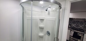 Shower, hair dryer, towels, soap - One bedroom apartment in Toronto's Hip Hotspot (Toronto)