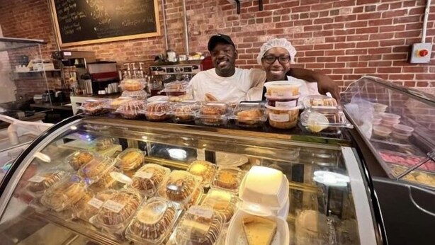 A bakery counter with various baked goods and a chalkboard menu. - The Cozy Cottage at Cocoa Village-Private Oasis (Cocoa)