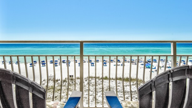 A beach view from a balcony with lounge chairs and umbrellas. - Crystal Sands 312B. Completely Renovated Stunner, Free Beach Service, Pool. (Destin)