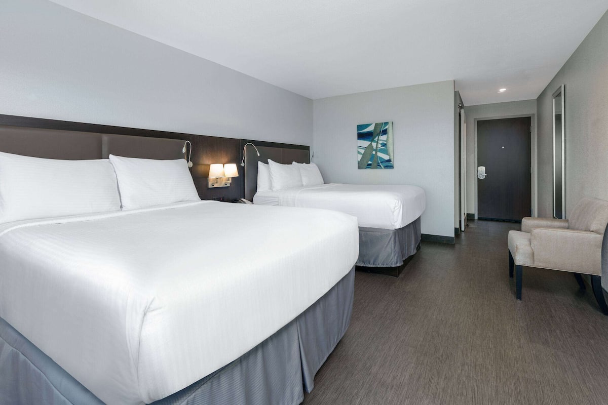 Suite, 2 Queen Beds, Non Smoking, City View (Balcony, NonSmoking) | Desk, iron/ironing board, free WiFi, bed sheets