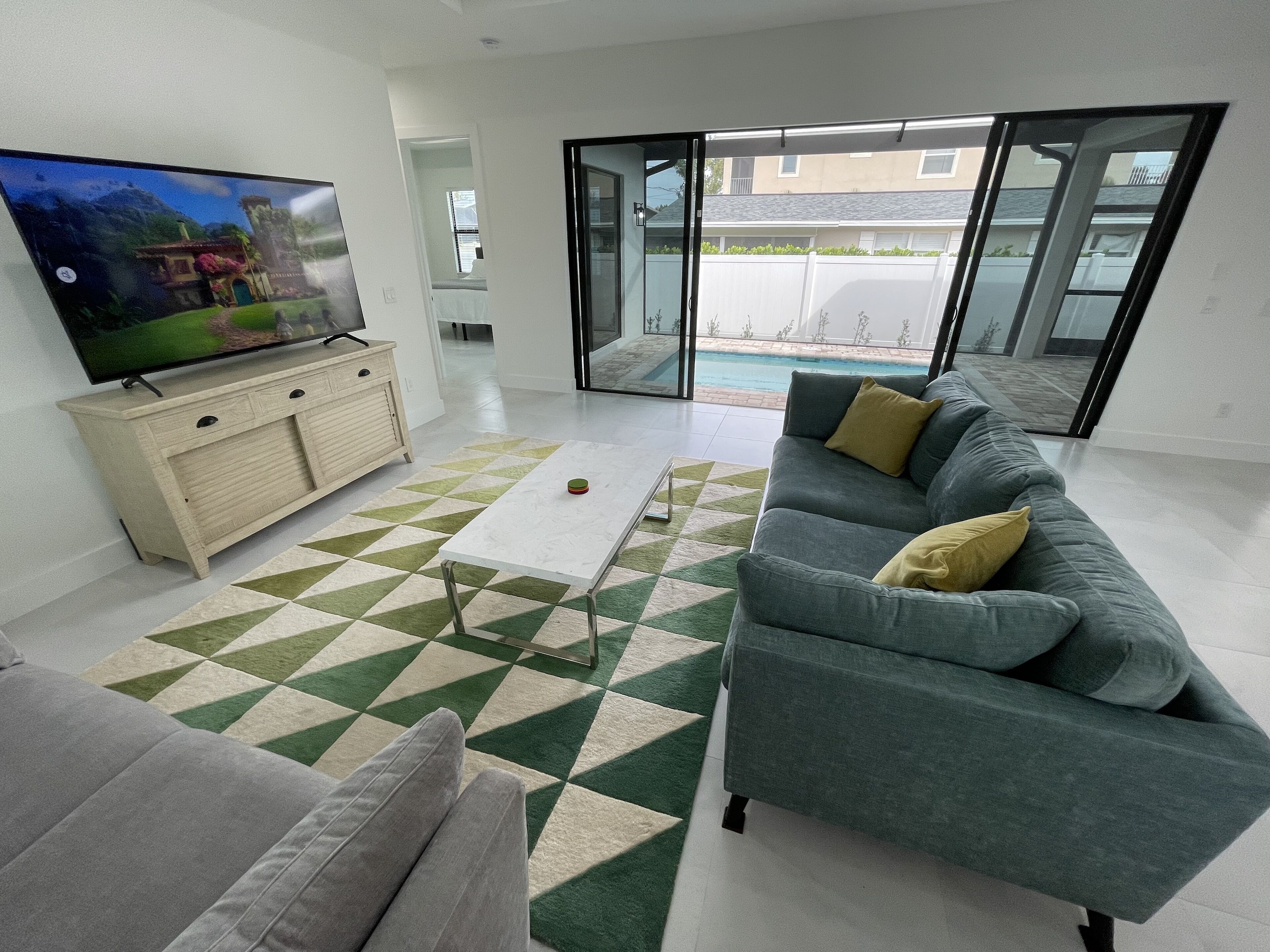 Cheerful pool home a short bike ride to Vanderbilt Beach!