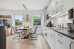 Coffee/tea maker, fridge, microwave, oven