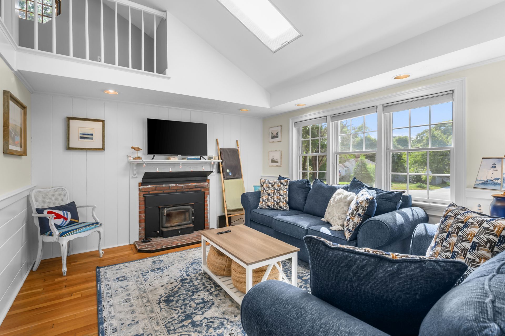 TV, fireplace, books