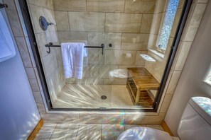 Shower, hair dryer, towels, shampoo