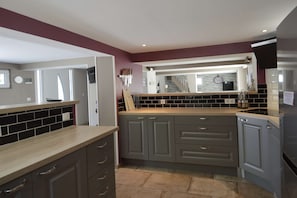 Coffee/tea maker, fridge, microwave, oven