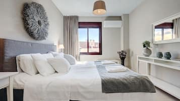 2 slaapkamers, een strijkplank/strijkijzer, gratis wifi, beddengoed