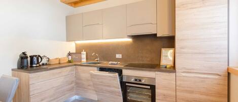 Réfrigérateur, four, plaque de cuisson, lave-vaisselle