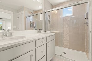 Shower, hair dryer, towels