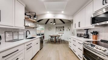 Coffee/tea maker, fridge, microwave, oven