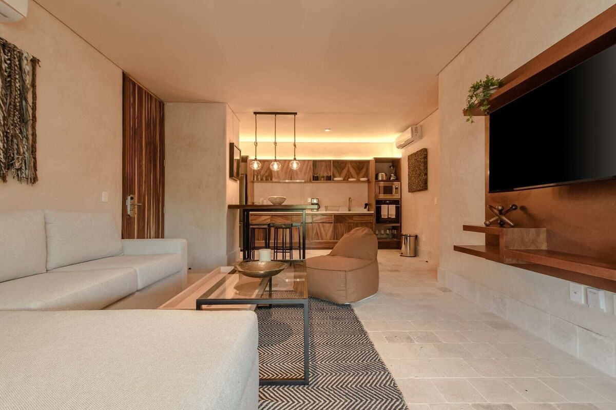 Deluxe Apartment, 2 Bedrooms, Private Pool | Living room | 50-inch Smart TV with digital channels, TV, books