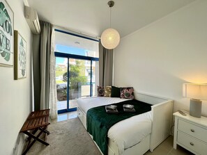 2 dormitorios, tabla de planchar con plancha, wifi gratis y ropa de cama