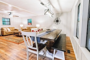 Dining - Luxurious cabin with fire pit, kayaks, and dock. (Arley)
