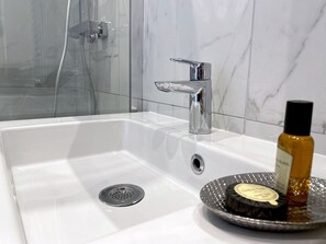 Shower, free toiletries, hair dryer, towels