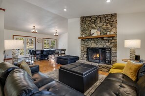 Smart TV, fireplace, table football, books