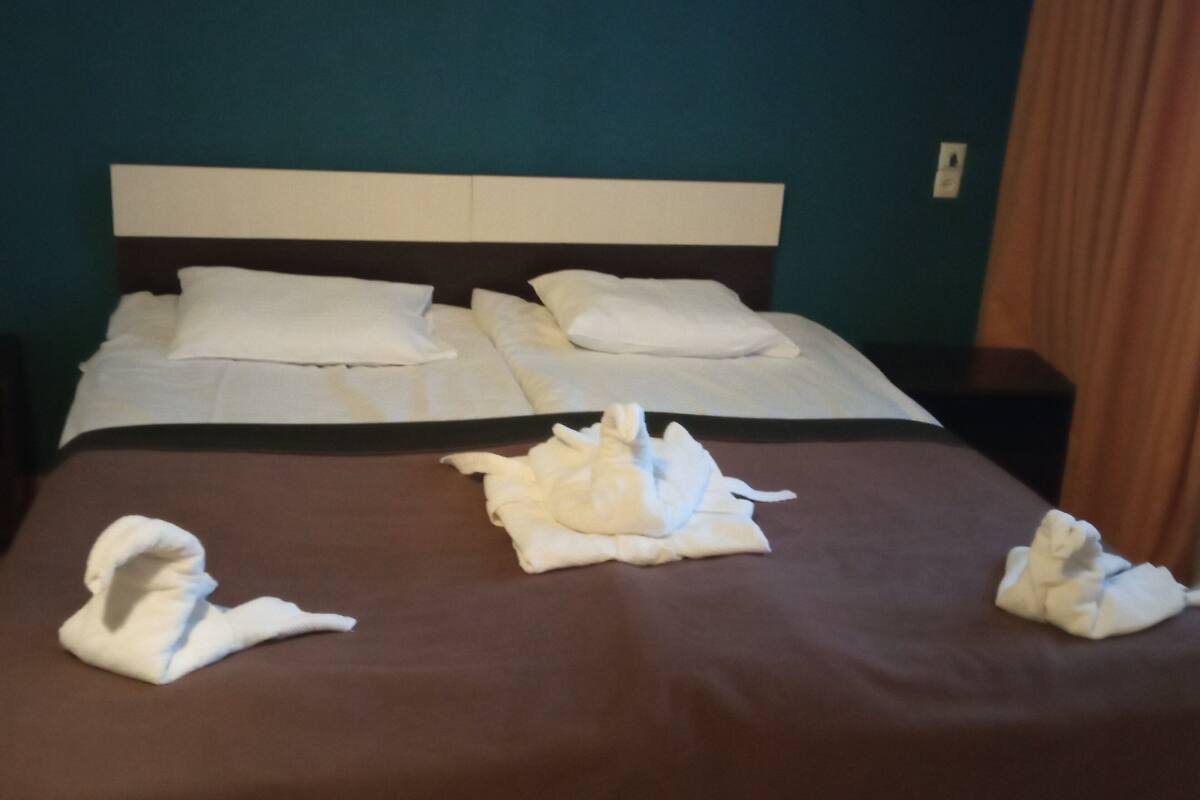 Premium bedding, down comforters, desk, laptop workspace
