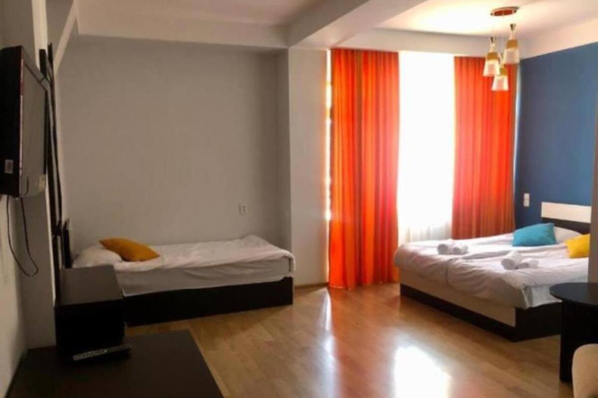 Premium bedding, down comforters, desk, laptop workspace