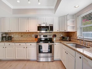 Fridge, microwave, oven, stovetop - Seahorse Villa 856 98th – Short Distance to Beaches, Shopping, & Dining (Naples)