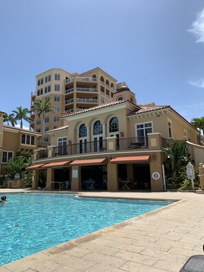 Outdoor pool, a heated pool - Indulge in breathtaking Ocean and Bay Views from the balcony-Exquisite 3BR/2 BA (Clearwater)