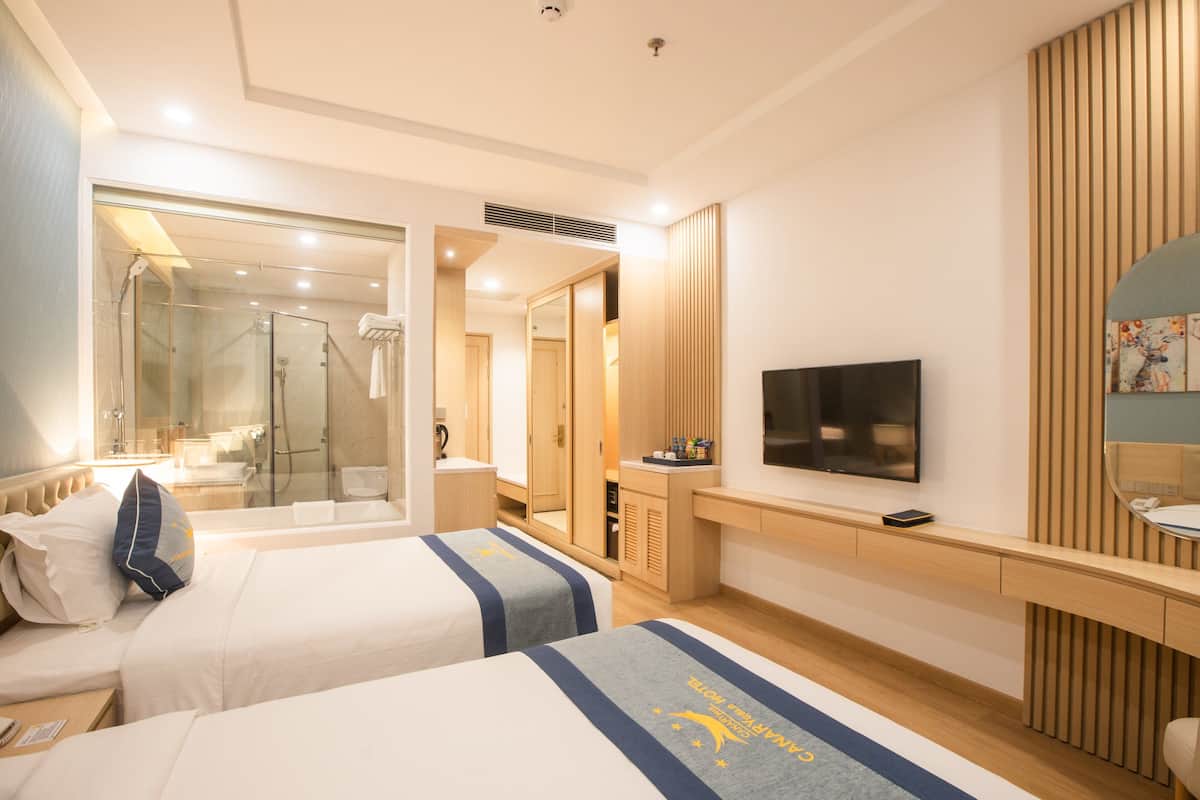 Premium bedding, memory-foam beds, free minibar items, in-room safe