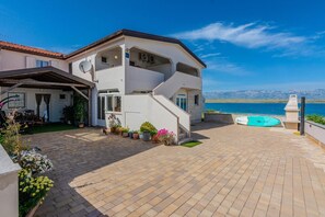 Enjoy a panoramic view of the surrounding landscape from this two-story property.