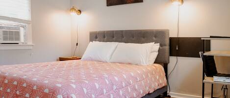 1 bedroom, desk, iron/ironing board, travel crib