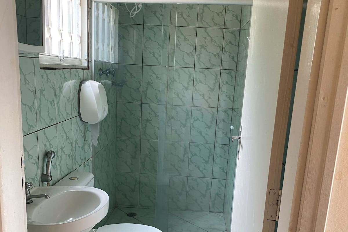 Shower, towels, soap, shampoo