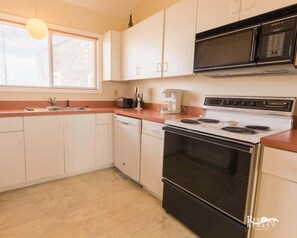 Fridge, microwave, oven, stovetop - 1838 - Paradise Suite, a spacious 2-bedroom condo in Corolla, NC (Corolla)